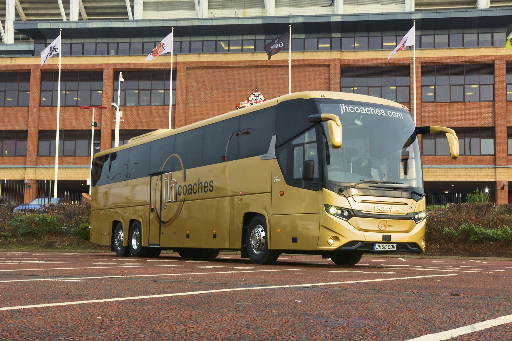 Coach outside stadium