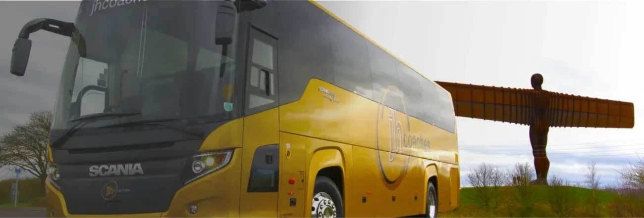 Coach with Angel of the north