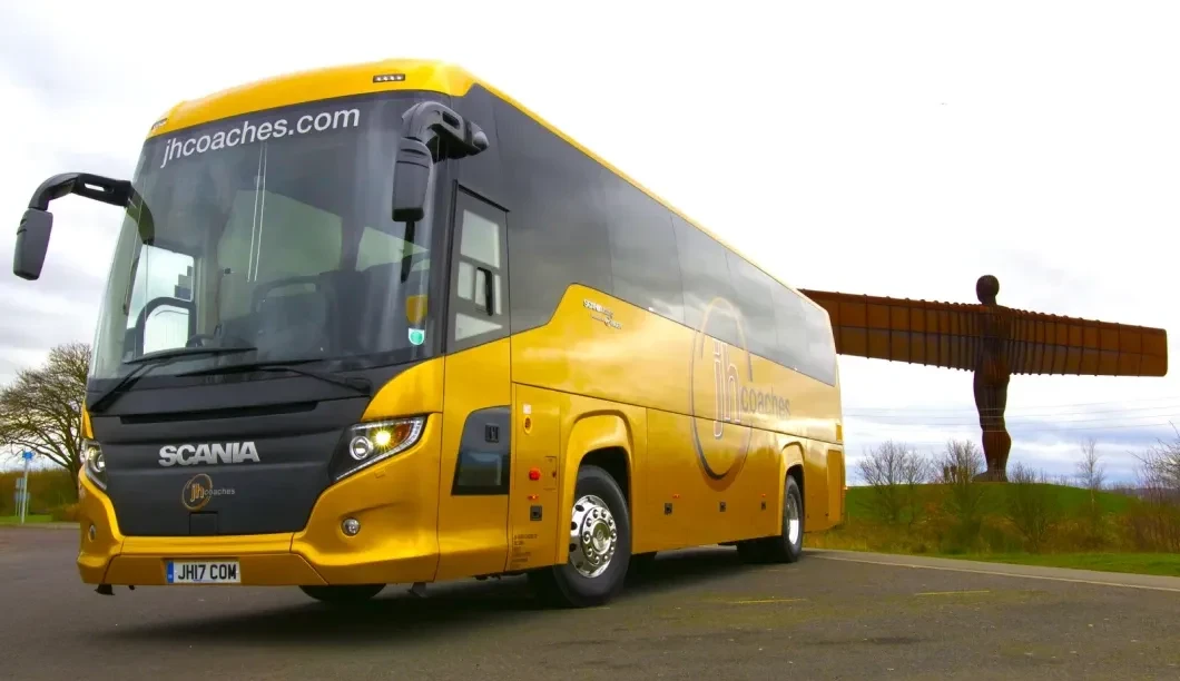 Coach with Angel of the north